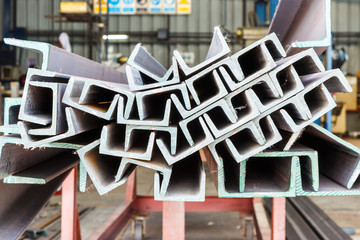 Wall Mural - Heap of U shape beam steel in factory shelf