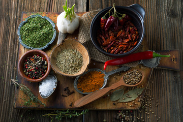 Wall Mural - Spices on the wooden background