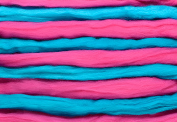 Wall Mural - Turquoise and pink horizontal stripes. Background made of wool for felting.