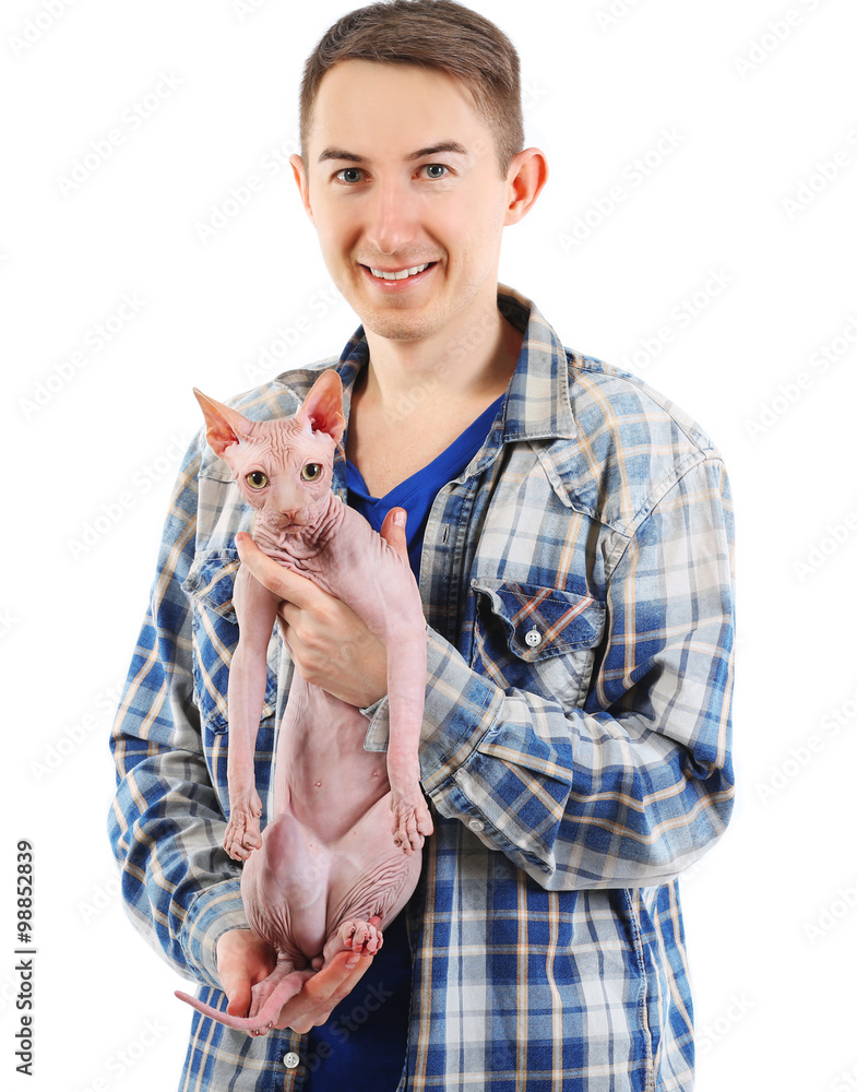 Young handsome man holding a cat, isolated on white