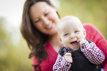 Little Baby Boy Having Fun With Mommy Outdoors