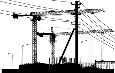  large black cranes and electric line