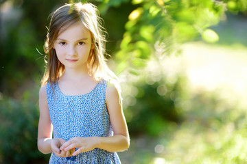 portrait of adorable little girl outdoors
