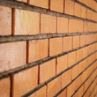 © sutichak - brick wall texture background material of industry construction