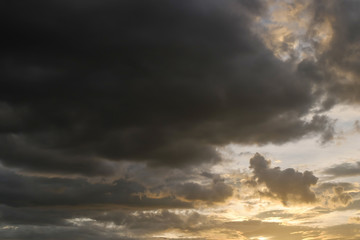 Wall Mural - black cloud on sunset dramatic dark sky background