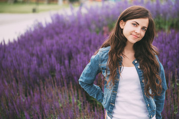 Wall Mural - beautiful young woman outdoor portrait.