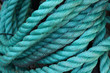 Hank of twisted turquoise rope.