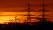 © silkehuettche - Strommasten im Sonnenaufgang