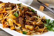 Chinese spicy beef and vegetable dish in plate 