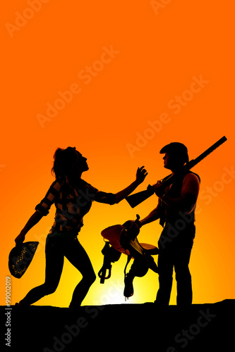 Silhouette Of A Woman With Her Hat In Hand Reaching Up To Cowboy Buy This Stock Photo And Explore Similar Images At Adobe Stock Adobe Stock Find the perfect woman reaching up isolated stock photos and editorial news pictures from getty images. adobe stock