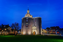 Historic Drommedaris Gate Of Enkhuizen City In The Evening Illumination, The Netherlands