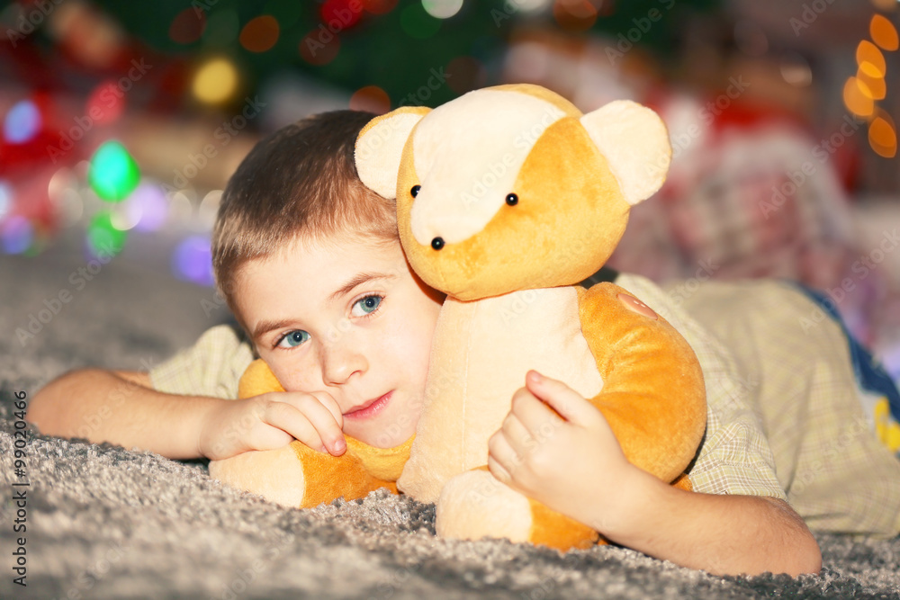 Portrait of little boy on a blurred background