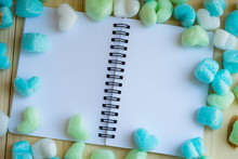 Blue Green Hearts And Blank Notebook In Clear Tone