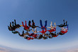© Mauricio G - Skydiving big group formation, teamwork.