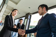 © leungchopan - Group of business people hand shaking for making a deal