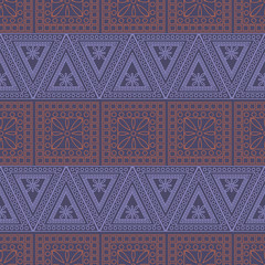 Wall Mural - Seamless vector pattern. Symmetrical geometric background with red and blue triangles on the dark backdrop. Decorative ornament.