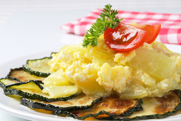 Wall Mural - Roasted zucchini with potato egg scramble