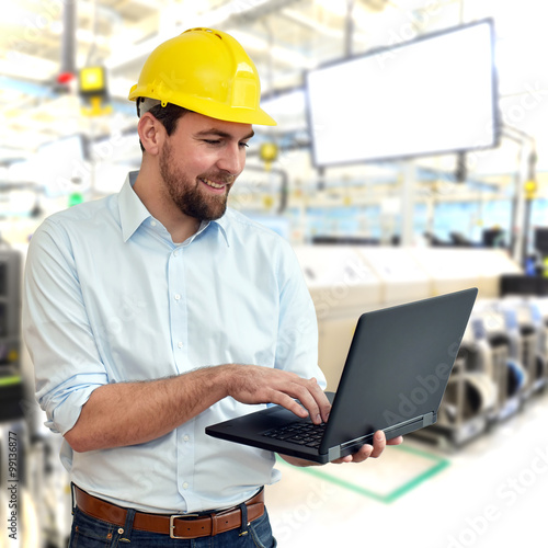 Ingenieur Im Maschinenbau Friendly Engineering In Mechanical Engineering Uses Computer In A High Tech Factory Buy This Stock Photo And Explore Similar Images At Adobe Stock Adobe Stock