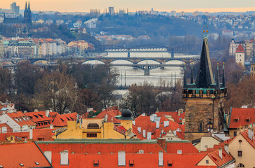 Wall Mural - Traditional red roofs in old town of Prague and river Vltava