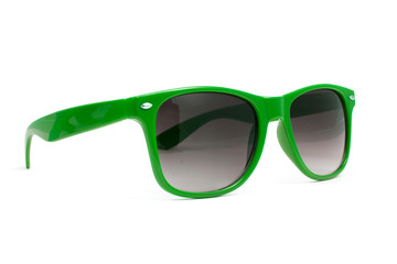 Wall Mural - green sunglasses on white background