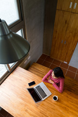 Poster - Asian woman use of the laptop computer at home