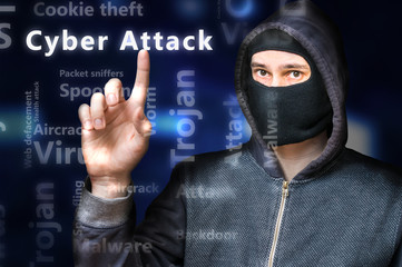 Wall Mural - masked anonymous hacker is pointing on cyber attack.