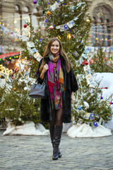 Wall Mural - Young beautiful woman in stylish mink coat