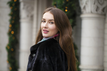 Wall Mural - Young beautiful woman in stylish mink coat