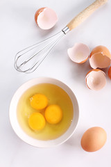 Wall Mural - raw eggs in bowl.