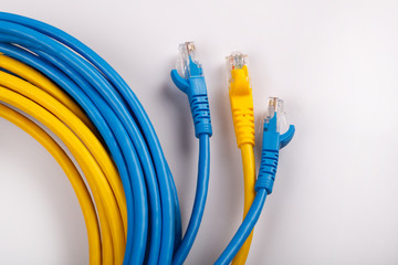 Wall Mural - Yellow and Blue Network Cable with molded RJ45 plug