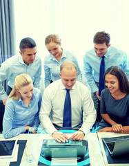 Sticker - smiling business people with laptop in office