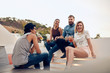 © Jacob Lund - Young people having drinks at party