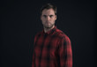© ysbrandcosijn - Hipster lumberjack fashion man in red checkered shirt.