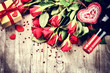 St Valentine's setting with red roses bouquet, present and red w