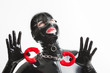 © Richard Semik - portrait of woman wearing latex clothes with handcuffs