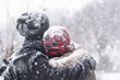 © creativefamily - Couple in love outdoors hugging on a winter day