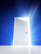 Open white door with rays of light on blue wall