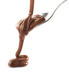 Sticker - Melted milky brown chocolate pouring from a spoon, isolated on white