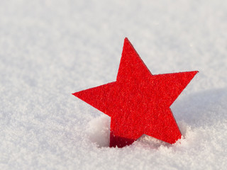 bright red star in the snow