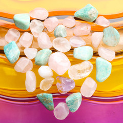 Canvas Print - Heart shaped composition of semiprecious stones on bright background