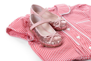 Sticker - Shiny pink shoes and red plaid shirt on white background