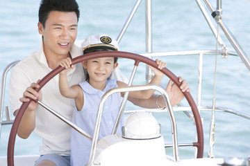 Father and daughter sailing