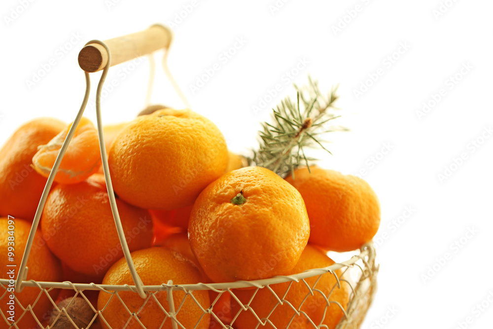 Tangerines in metal basket, close up