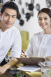© Blue Jean Images - Wait staff standing in restaurant