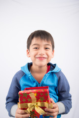 Little boy opening gift present box on white background