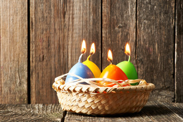 Canvas Print - Easter candles on wooden table