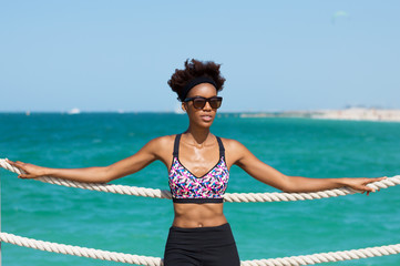 Slim african woman at the seaside