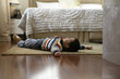 © Blue Jean Images - Young Boy Lying On Floor