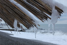 Thatched Roof On A Beach Umbrella At Winter