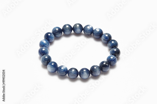 Fotografia, Obraz Lucky stone bracelet on white background.